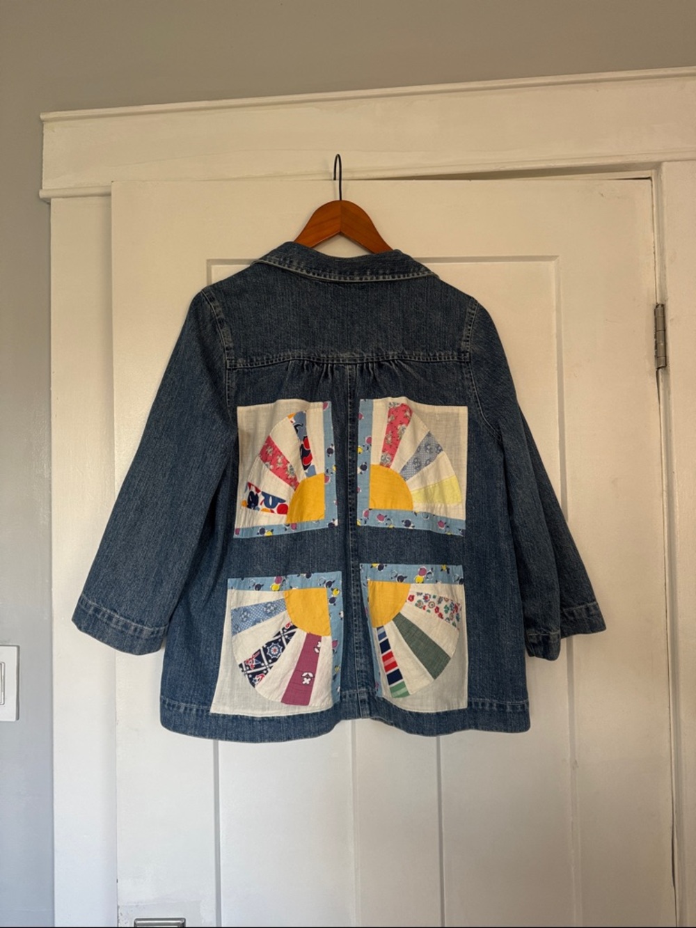 Denim Jacket with Retro Patchwork Sun Design